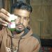 বিষের বোতল হাতে প্রেমিকার বাড়িতে অনশনে যুবক