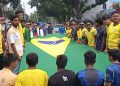 দিনাজপুরে বৃষ্টি উপেক্ষা করে ব্রাজিল সমর্থকদের শোভাযাত্রা